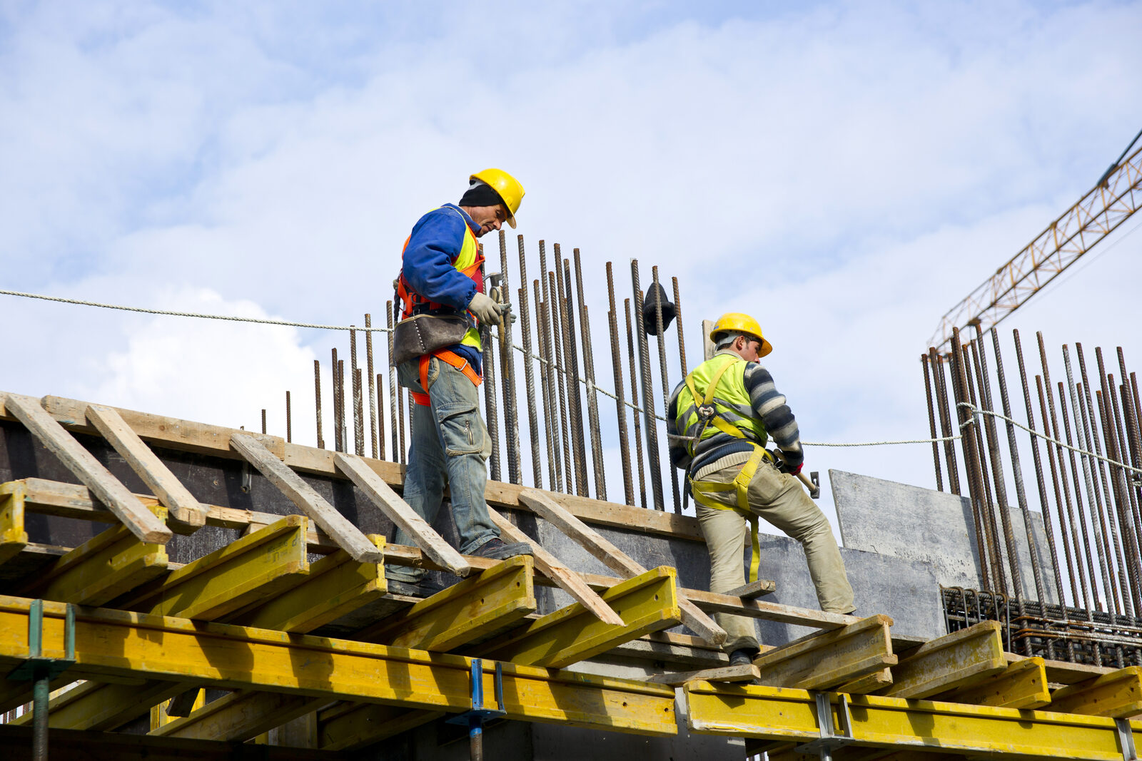 Building trades workers on a construction site